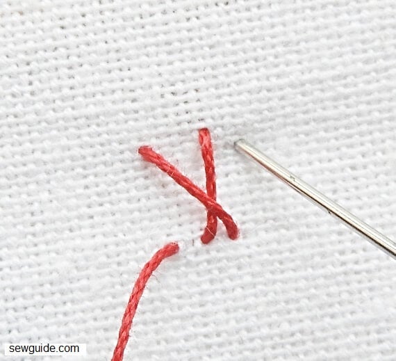 start crossing the straight stitches