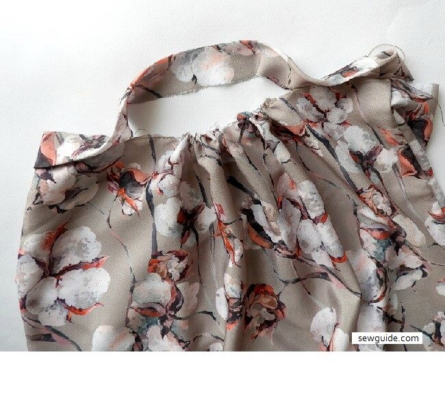 attach band to gathered bodice