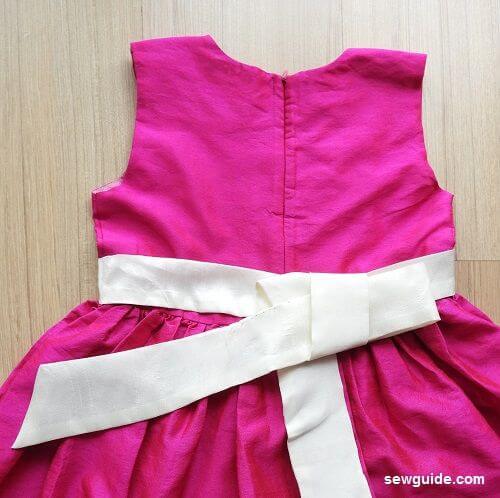 tie a sash bow in a dress