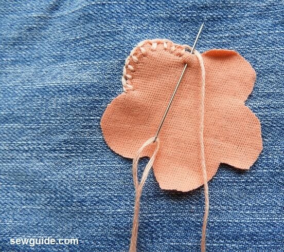 hand sewing applique using blanket stitches