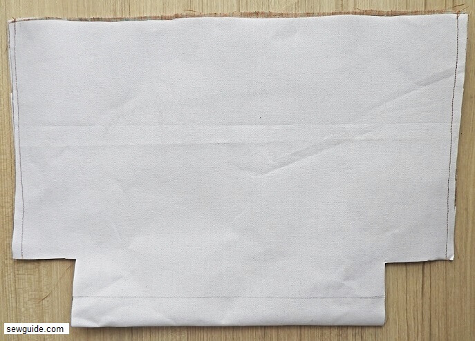 Sew the side seams of the outside fabric of the zippered tote bag