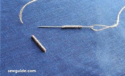 insert the zardosi thread through the needle