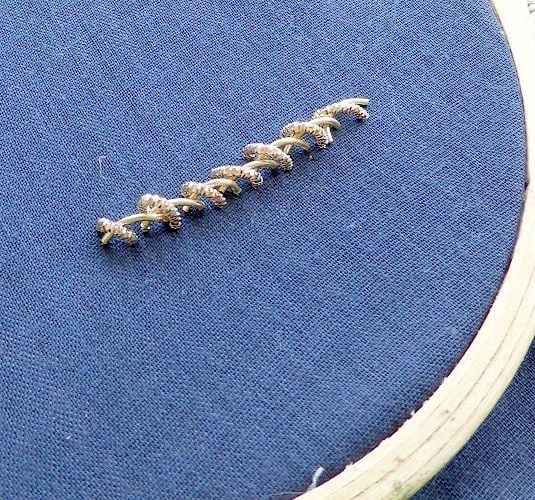 Whipped stem stitch made using zardosi thread
